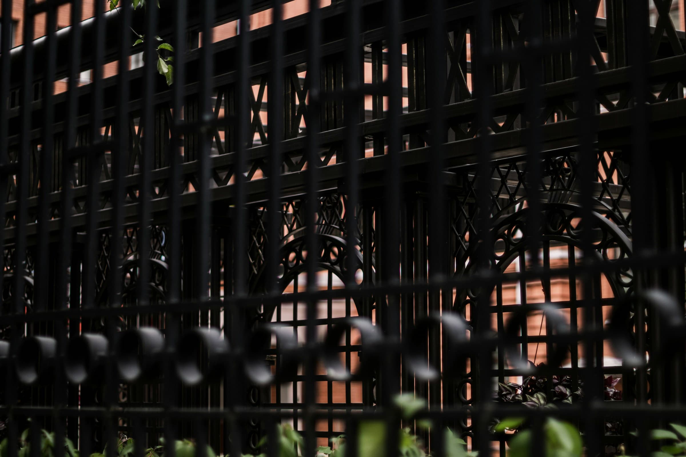 Hero Fence commercial perimeter — black ornamental steel